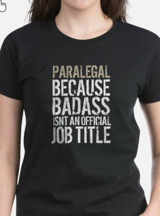 T-Shirt reading Paralegal, because badass isn't an official job title